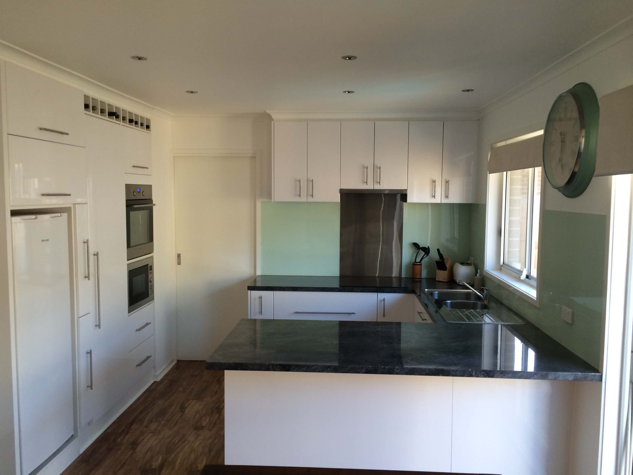BD-builders-white-kitchen-glass-splashback-marble-countertop-remodel-mt-waverley